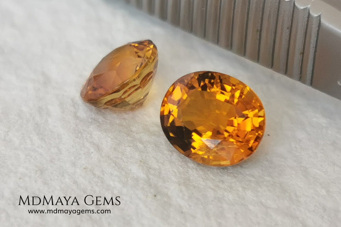 Orange Tourmaline Pair 1.46 ct. Oval Cut. Rare gemstones with a beautiful honey color. There are not many orange gems, although it is the favorite color of many people and these look impressive mounted in jewelry. Natural and untreated precious stones at an affordable price.