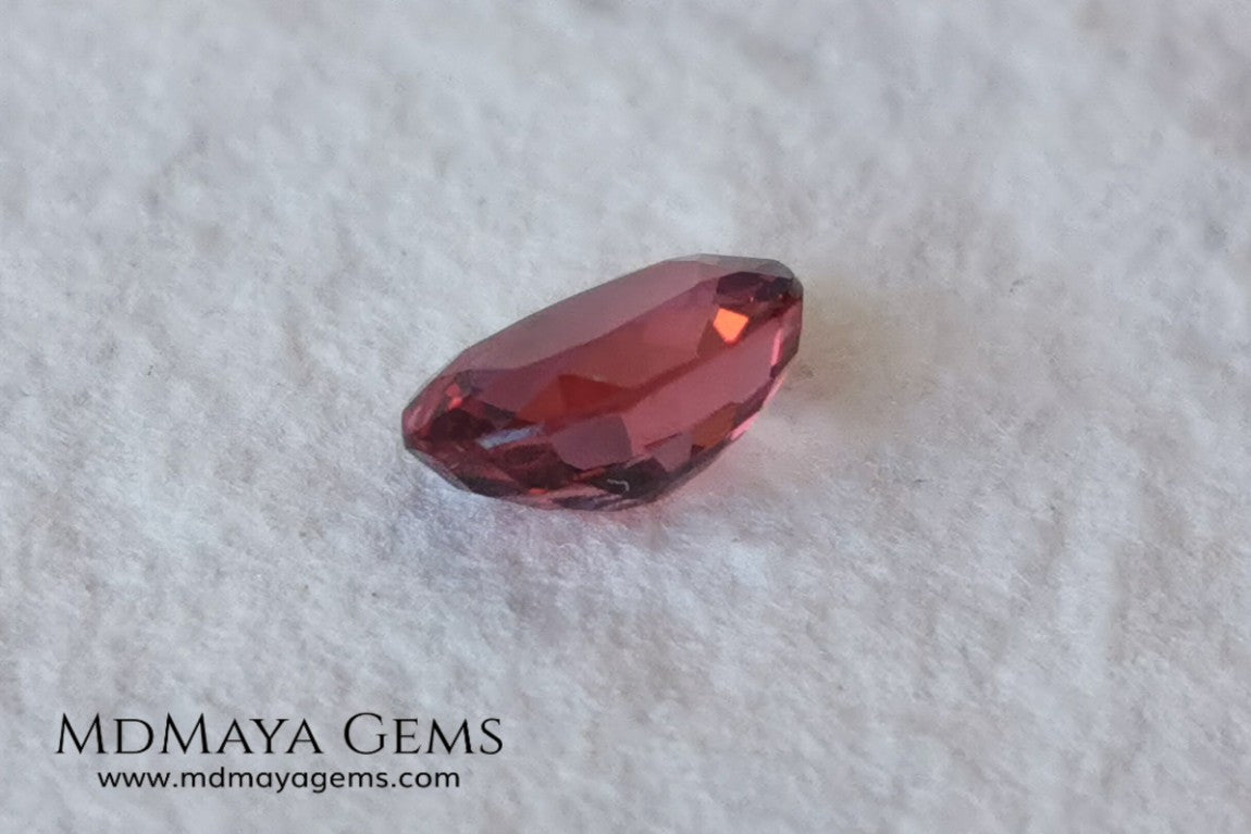 Unheated Burmese Orangey Red Spinel. Oval Cut, 1.22 ct. This precious stone shows a beautiful color, it will look amazing in your custom jewelry.