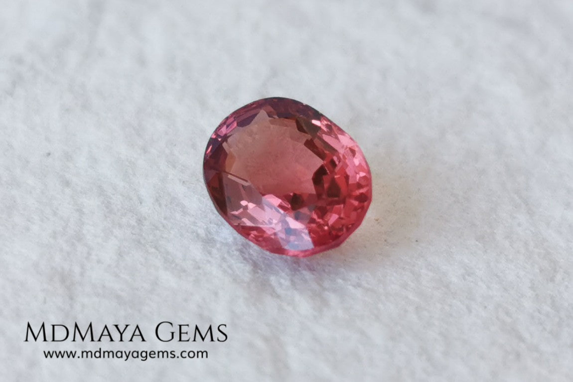 Unheated Burmese Orangey Red Spinel. Oval Cut, 1.22 ct. This precious stone shows a beautiful color, it will look amazing in your custom jewelry.