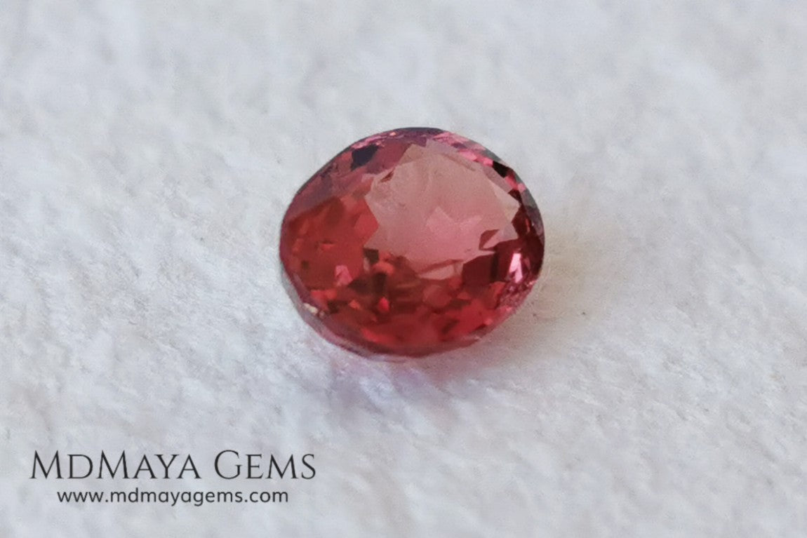 Unheated Burmese Orangey Red Spinel. Oval Cut, 1.22 ct. This precious stone shows a beautiful color, it will look amazing in your custom jewelry.
