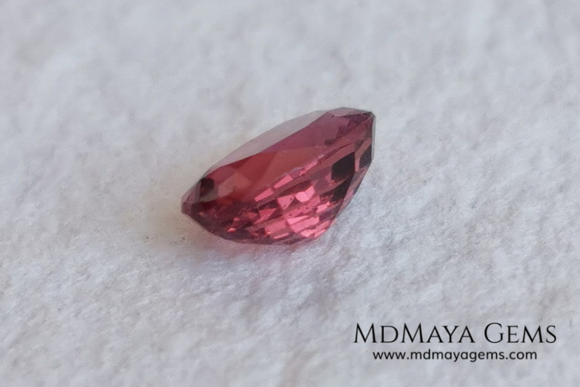 Unheated Burmese Orangey Red Spinel. Oval Cut, 1.22 ct. This precious stone shows a beautiful color, it will look amazing in your custom jewelry.