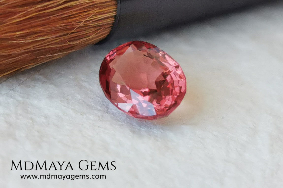 Unheated Burmese Orangey Red Spinel. Oval Cut, 1.22 ct. This precious stone shows a beautiful color, it will look amazing in your custom jewelry.