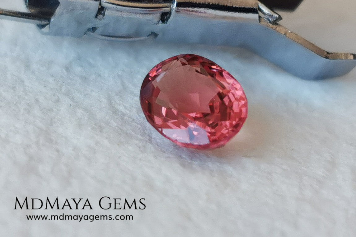 Unheated Burmese Orangey Red Spinel. Oval Cut, 1.22 ct. This precious stone shows a beautiful color, it will look amazing in your custom jewelry.