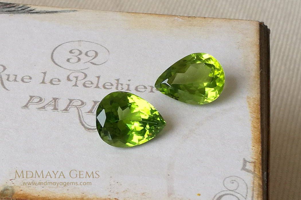 Richest Green Peridot Gems Pear Cut 13.41 ct pair