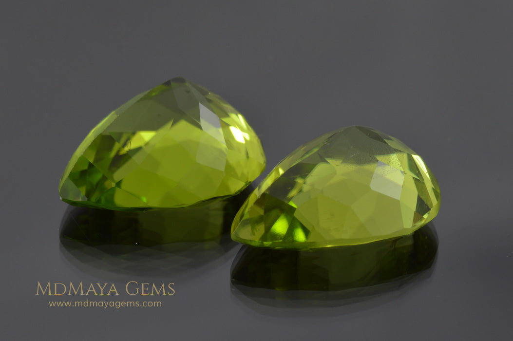 Richest Green Peridot Gems Pear Cut 13.41 ct pair