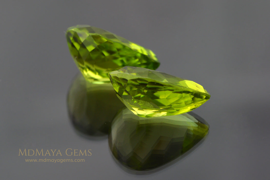 Richest Green Peridot Gems Pear Cut 13.41 ct pair