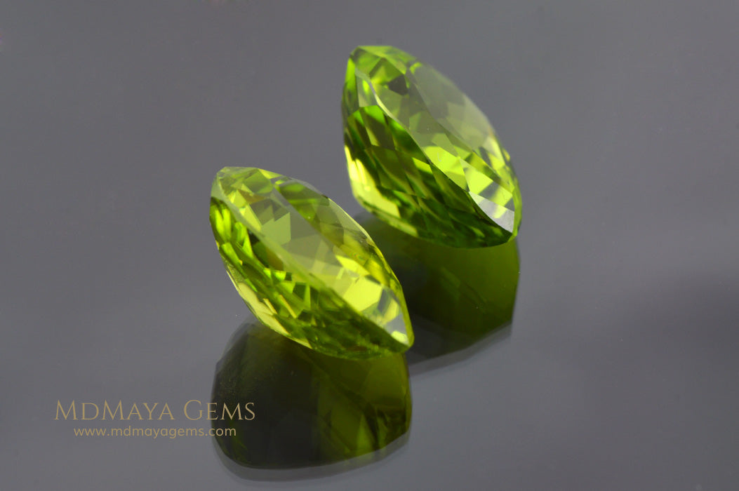 Richest Green Peridot Gems Pear Cut 13.41 ct pair