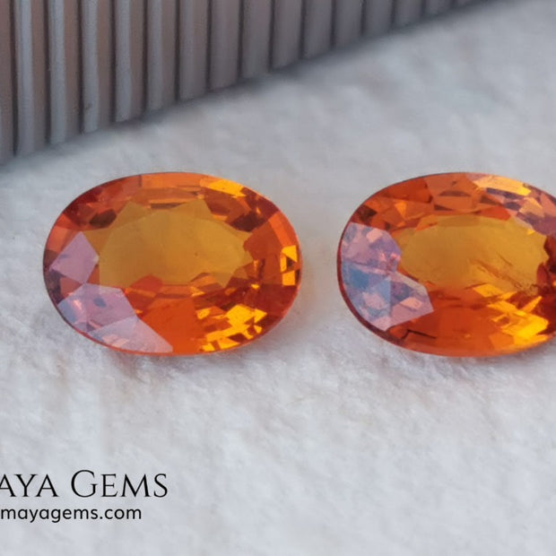  Pair Mandarin Garnet. Oval Cut. 1.82 ct total. Stunning and Bright Orange Spessartite Garnets. Beautiful pair of natural and untreated gemstones, they will be superb on some earrings. They are full of life, they are pure orange. Don't miss it!