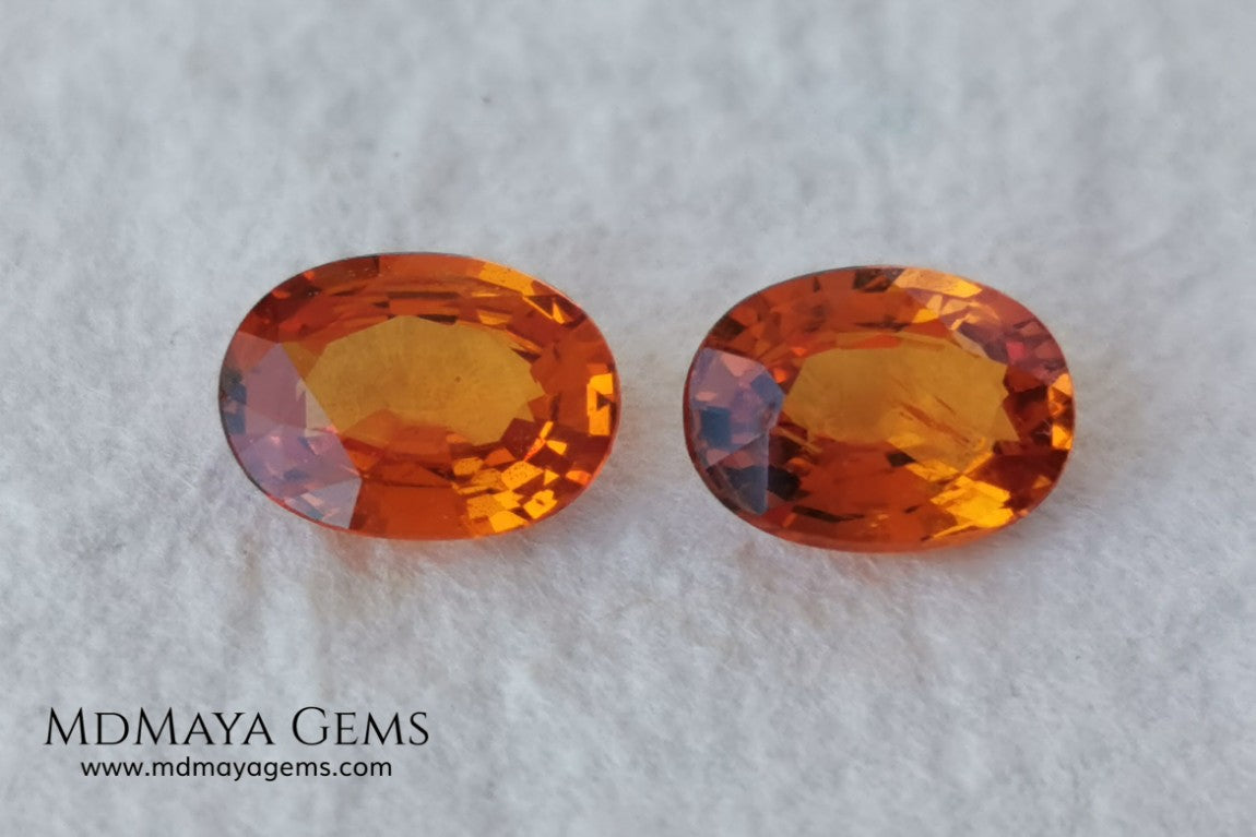  Pair Mandarin Garnet. Oval Cut. 1.82 ct total. Stunning and Bright Orange Spessartite Garnets. Beautiful pair of natural and untreated gemstones, they will be superb on some earrings. They are full of life, they are pure orange. Don't miss it!