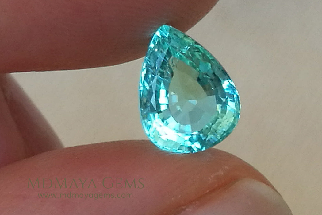 Finest Neon Greenish Blue Paraiba Pear Cut 2.21 ct under daylight