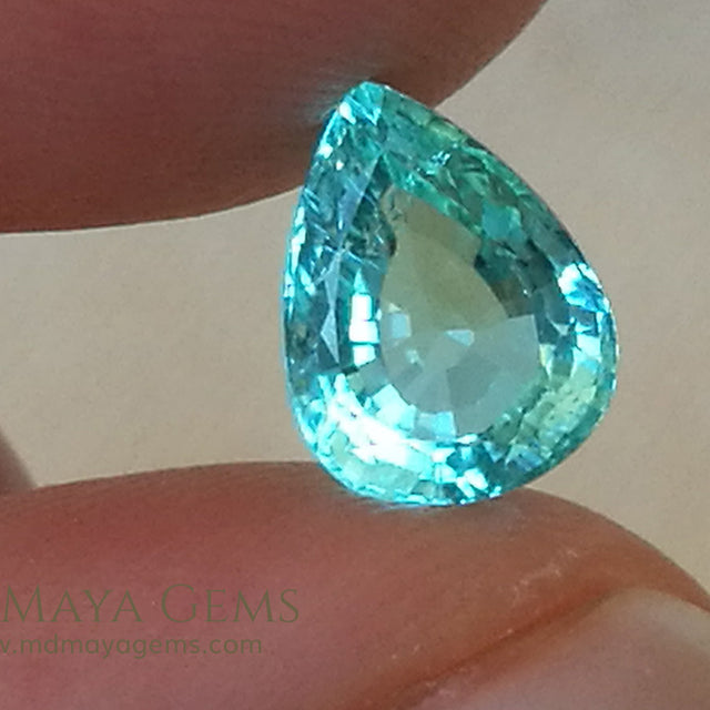 Finest Neon Greenish Blue Paraiba Pear Cut 2.21 ct under daylight