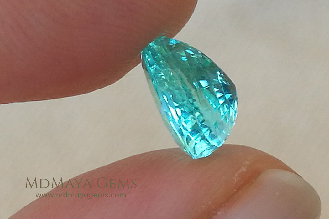 Finest Neon Greenish Blue Paraiba Pear Cut 2.21 ct under daylight