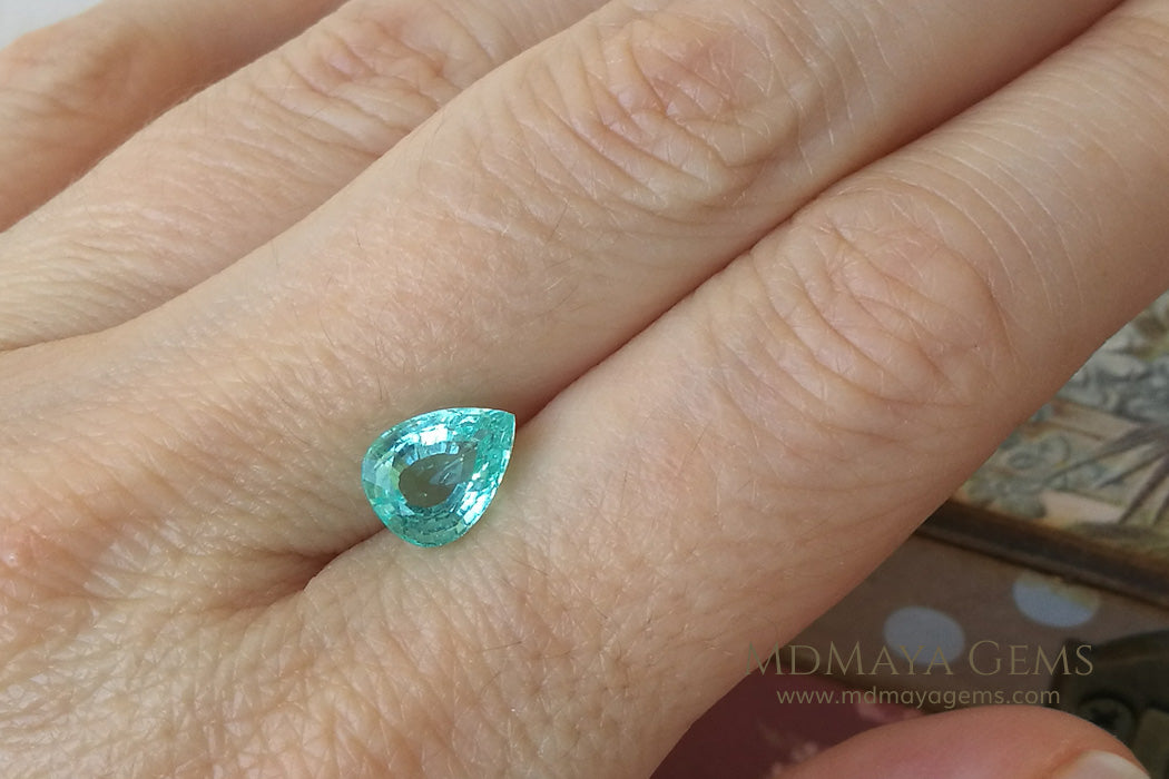 Finest Neon Greenish Blue Paraiba Pear Cut 2.21 ct under daylight