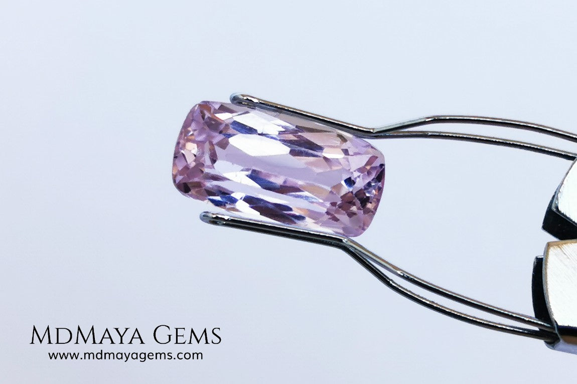  Nice Kunzite with a very bright and vivid color. This beautiful pink gem of 7.56 ct, has an elongated cushion cut that will look spectacular in any type of jewelry 