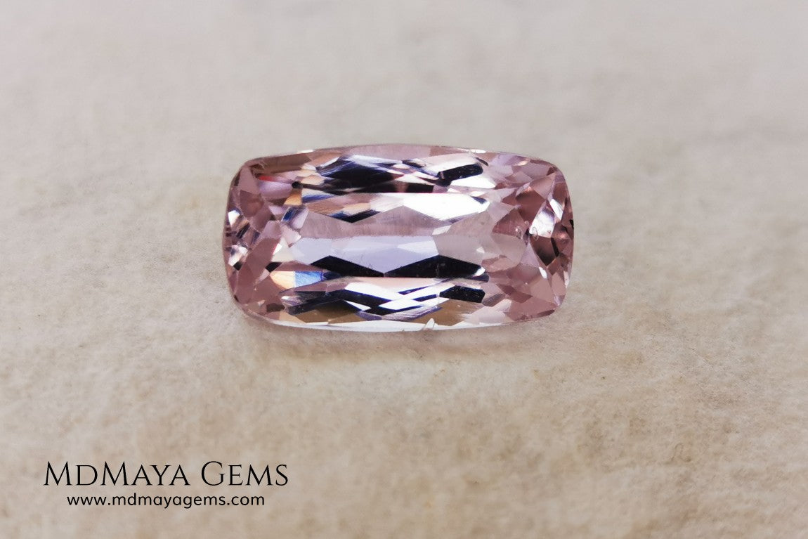  Nice Kunzite with a very bright and vivid color. This beautiful pink gem of 7.56 ct, has an elongated cushion cut that will look spectacular in any type of jewelry 