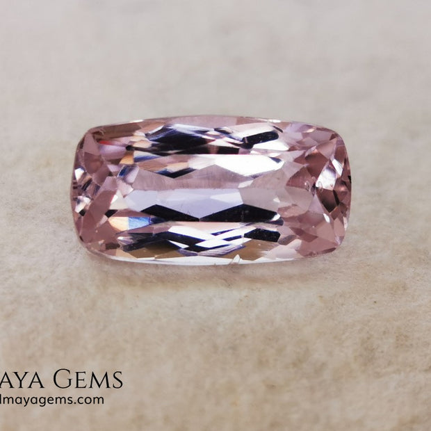  Nice Kunzite with a very bright and vivid color. This beautiful pink gem of 7.56 ct, has an elongated cushion cut that will look spectacular in any type of jewelry 