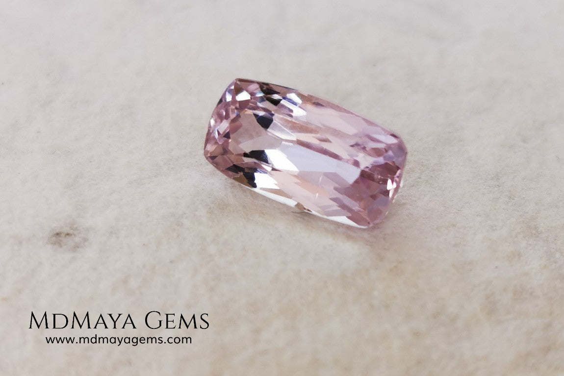  Nice Kunzite with a very bright and vivid color. This beautiful pink gem of 7.56 ct, has an elongated cushion cut that will look spectacular in any type of jewelry 