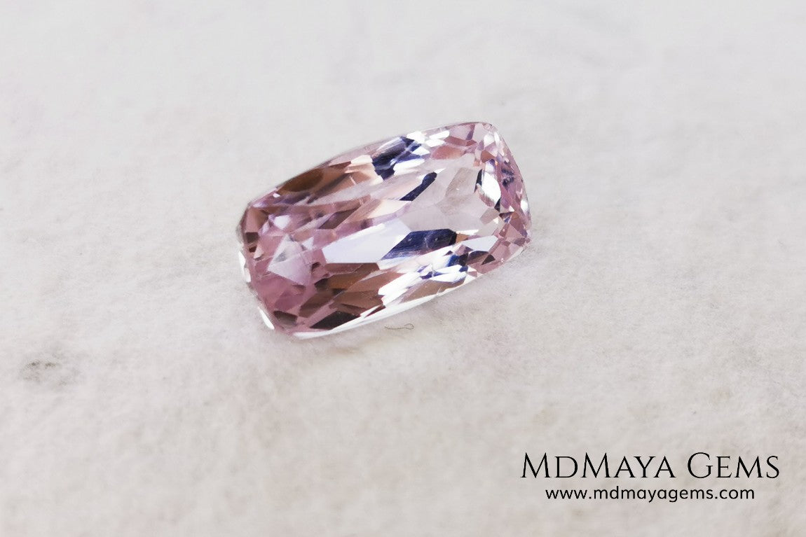  Nice Kunzite with a very bright and vivid color. This beautiful pink gem of 7.56 ct, has an elongated cushion cut that will look spectacular in any type of jewelry 