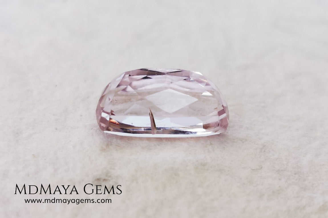  Nice Kunzite with a very bright and vivid color. This beautiful pink gem of 7.56 ct, has an elongated cushion cut that will look spectacular in any type of jewelry 