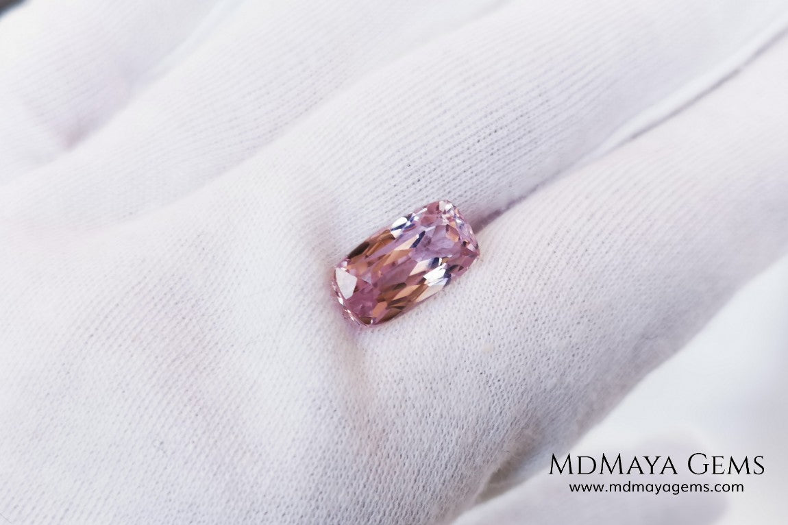  Nice Kunzite with a very bright and vivid color. This beautiful pink gem of 7.56 ct, has an elongated cushion cut that will look spectacular in any type of jewelry 