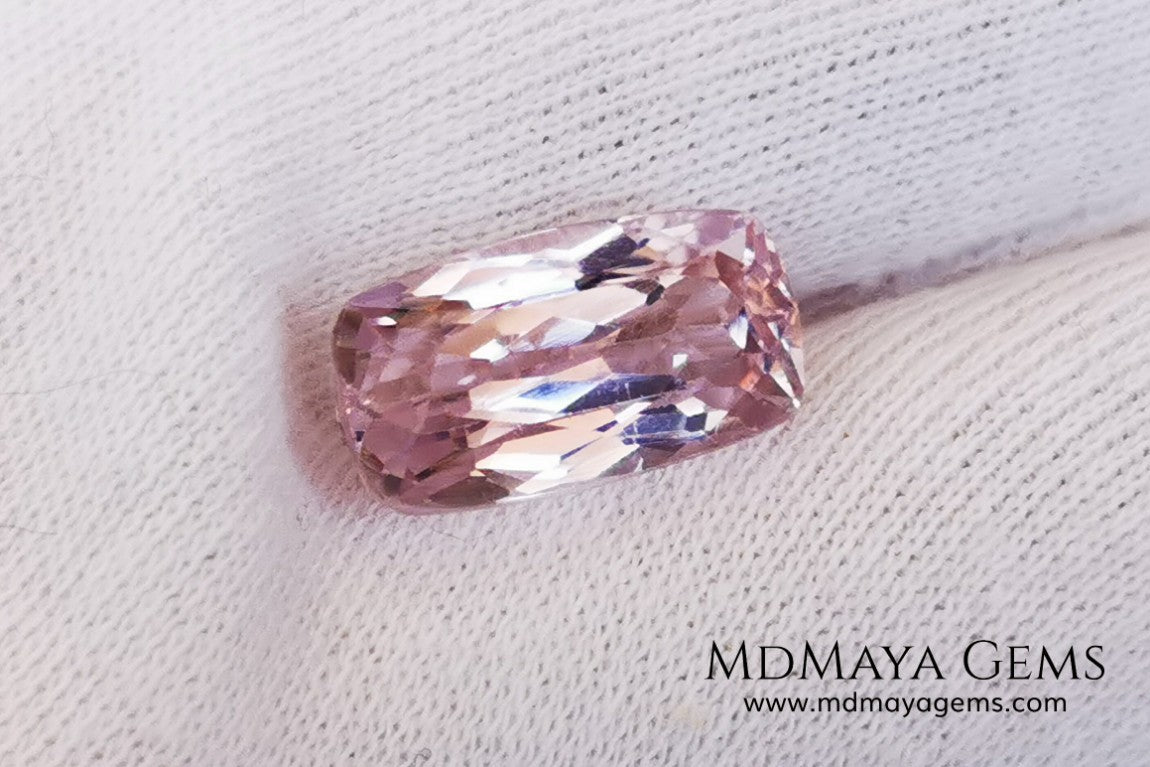  Nice Kunzite with a very bright and vivid color. This beautiful pink gem of 7.56 ct, has an elongated cushion cut that will look spectacular in any type of jewelry 