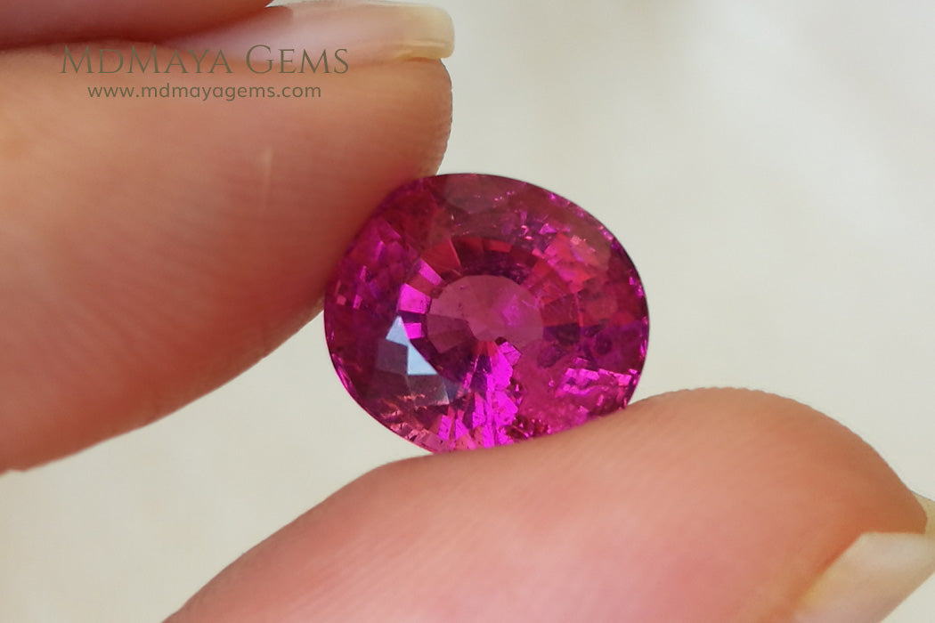 Vivid Rubellite African Tourmaline Oval Cut 6.25 ct under daylight