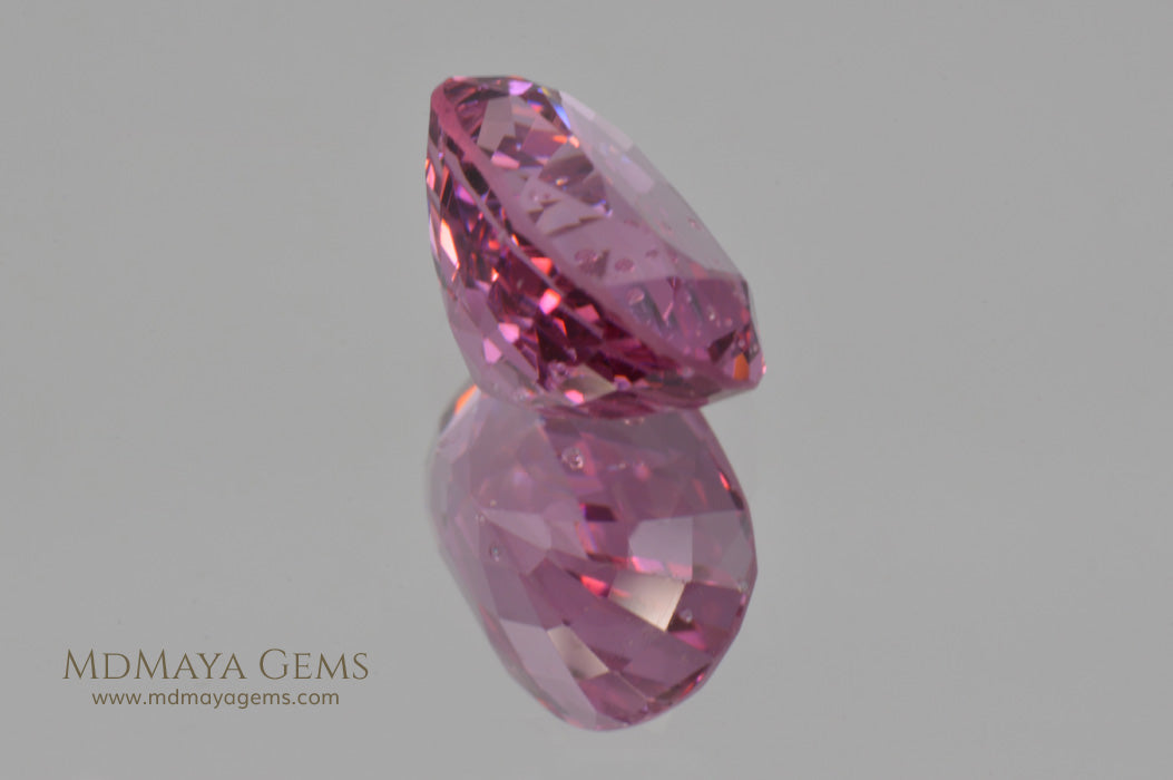 Girdle Pink Burmese Spinel Oval cut 2.44 ct under fluorescent light