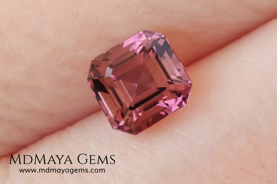 Reddish Pink tourmaline. Asscher cut - Square 6 mm. 1.45 ct.  Beautiful pink tourmaline, with great bright and saturation. It has a great quality of cut, very well proportioned. Its behavior under any type of light is very good. Looking gorgeous under any type of lighting. It would look perfect on an engagement ring or any jewel you can imagine. A great gem at a low price.
