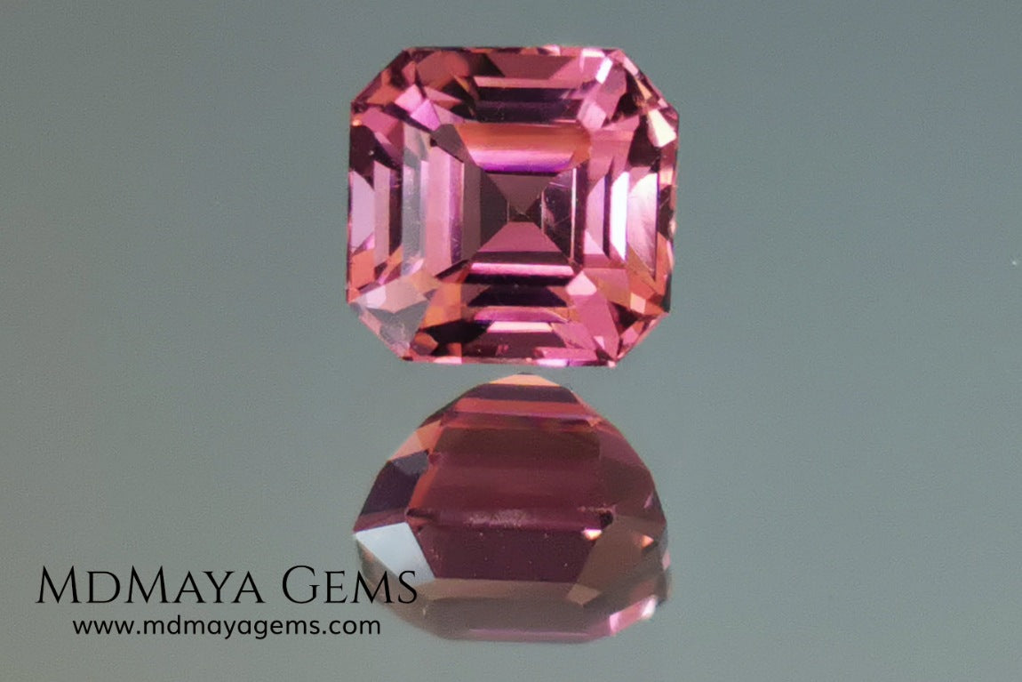 Reddish Pink tourmaline. Asscher cut - Square 6 mm. 1.45 ct.  Beautiful pink tourmaline, with great bright and saturation. It has a great quality of cut, very well proportioned. Its behavior under any type of light is very good. Looking gorgeous under any type of lighting. It would look perfect on an engagement ring or any jewel you can imagine. A great gem at a low price.