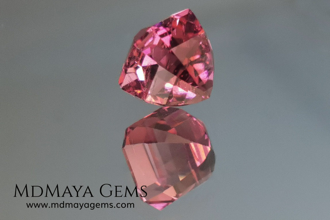 Reddish pink tourmaline. Asscher cut. 2.65 ct. This natural gemstone has a very saturated reddish-pink color, along with its beautiful cut and size, it will be look amazing in a ring. A great gem.