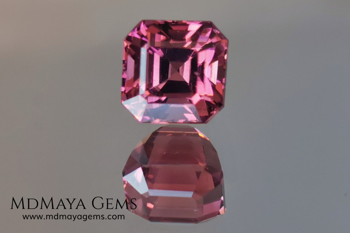 Reddish pink tourmaline. Asscher cut. 2.65 ct. This natural gemstone has a very saturated reddish-pink color, along with its beautiful cut and size, it will be look amazing in a ring. A great gem.