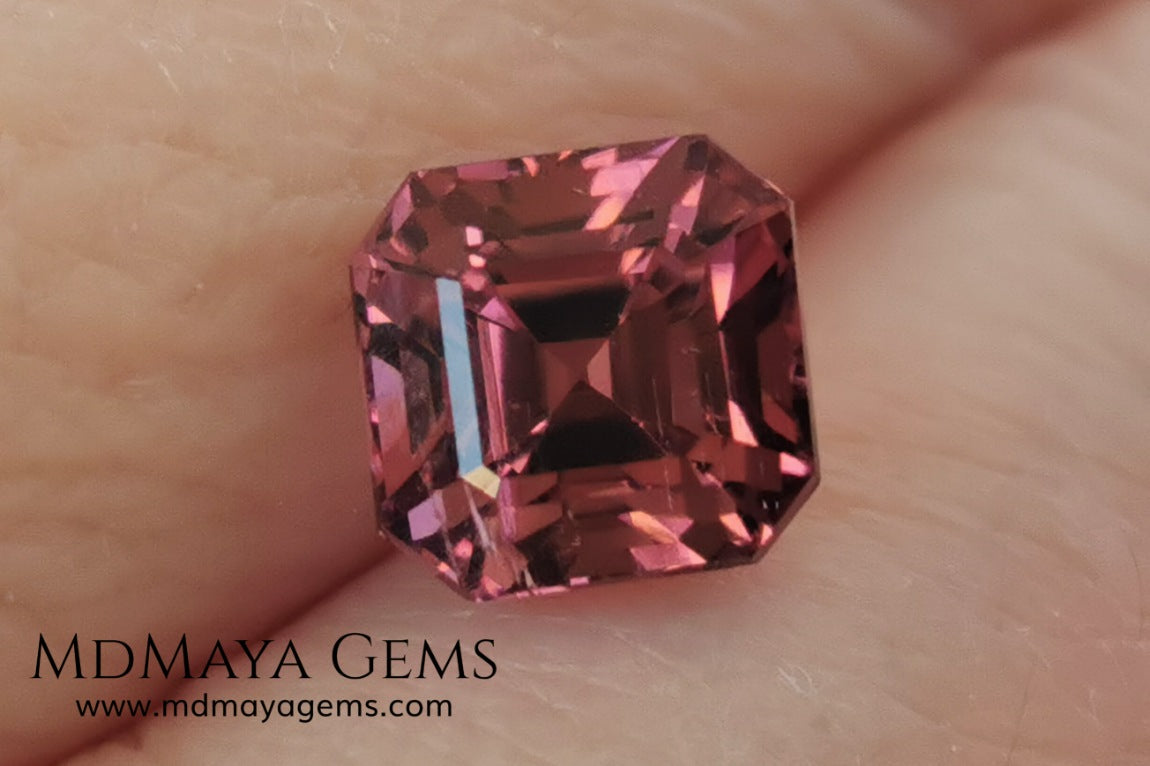 Reddish pink tourmaline. Asscher cut. 2.65 ct. This natural gemstone has a very saturated reddish-pink color, along with its beautiful cut and size, it will be look amazing in a ring. A great gem.