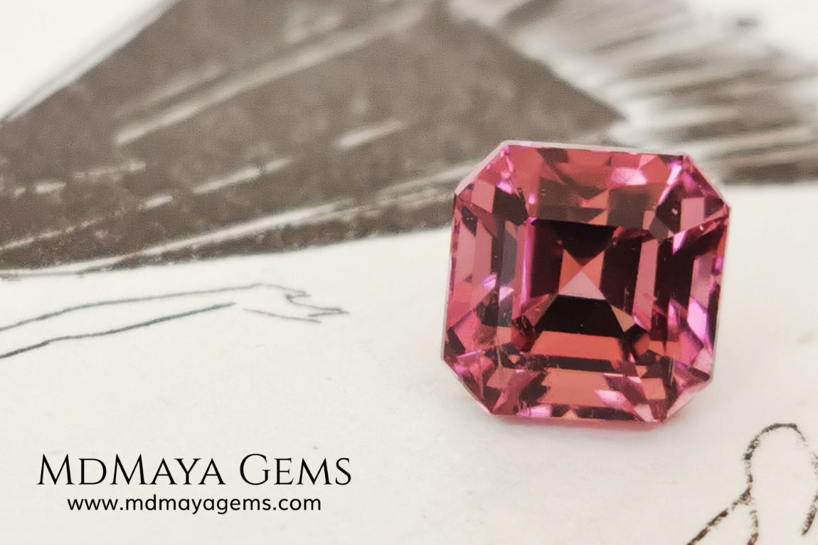 Reddish pink tourmaline. Asscher cut. 2.65 ct. This natural gemstone has a very saturated reddish-pink color, along with its beautiful cut and size, it will be look amazing in a ring. A great gem.