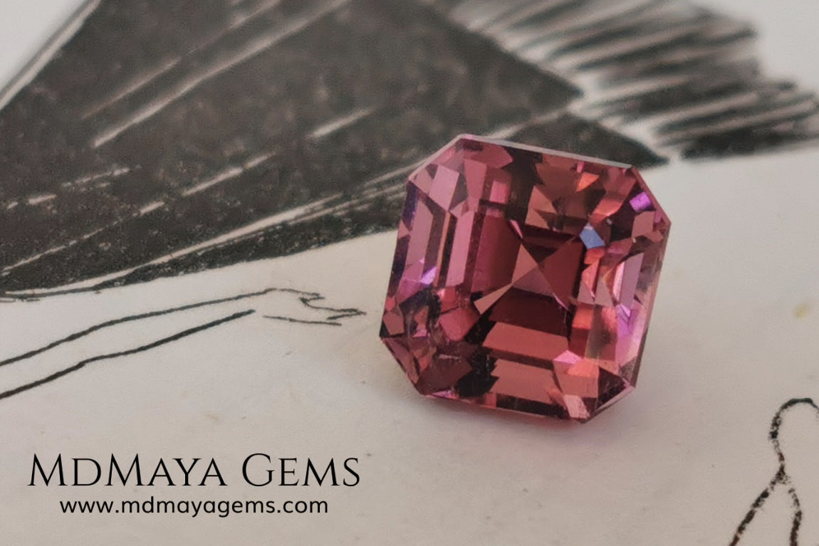 Reddish pink tourmaline. Asscher cut. 2.65 ct. This natural gemstone has a very saturated reddish-pink color, along with its beautiful cut and size, it will be look amazing in a ring. A great gem.
