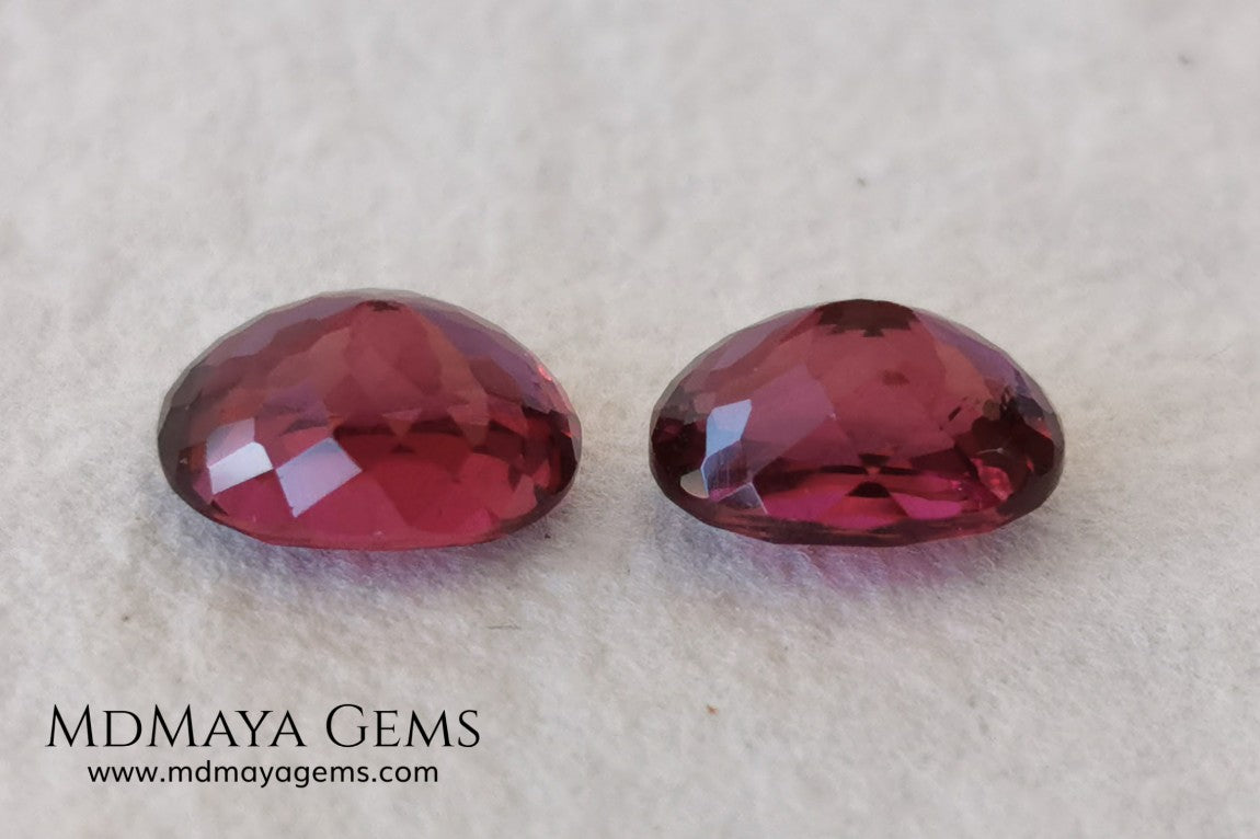  Purple Red Rhodolite Pair 3.41 ct. Oval cut. This beautiful pair of rhodolites shows the best color you can find in rhodolites. It has a very good size and they will look incredibly beautiful on some earrings or on a pair of cufflinks.