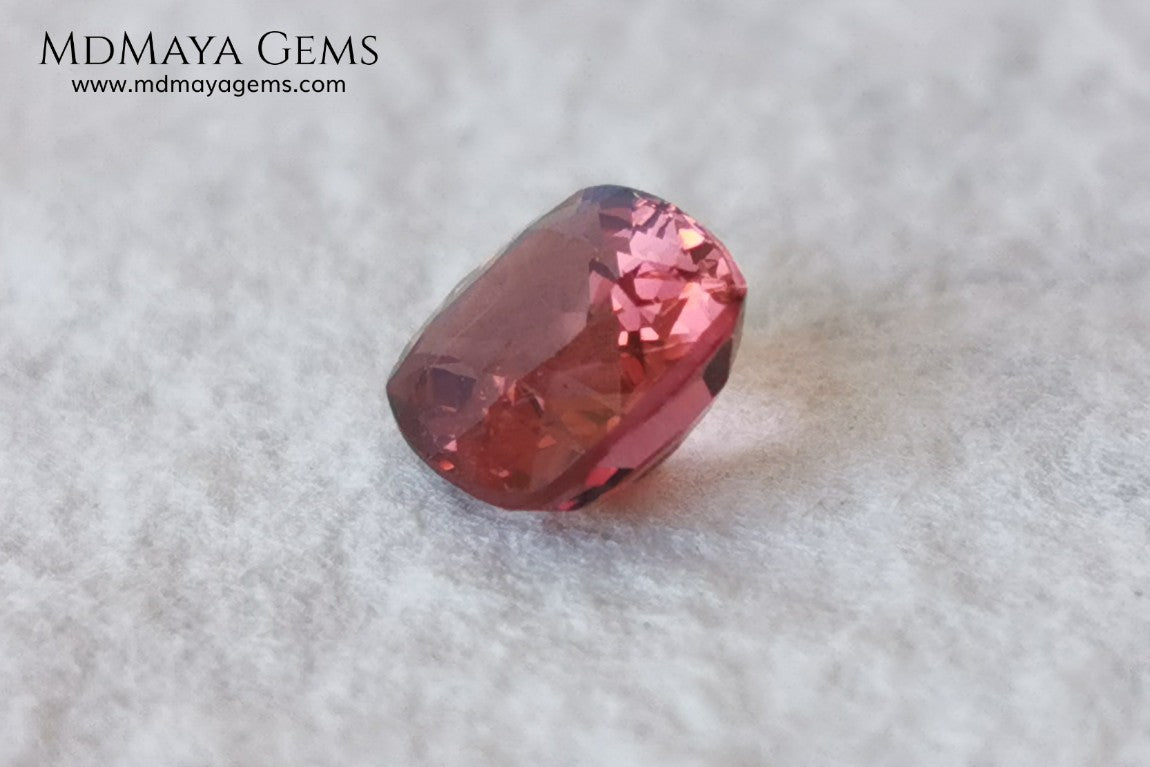 Red - Orange Spinel. Cushion Cut. 1.11 cts. Beautiful untreated gem for your personalized jewelry. This beautiful spinel is so inexpensively priced due to a fracture in the pavilion, it is not visible and does not affect the beauty of the gem at all.