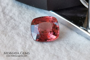 Red - Orange Spinel. Cushion Cut. 1.11 cts. Beautiful untreated gem for your personalized jewelry. This beautiful spinel is so inexpensively priced due to a fracture in the pavilion, it is not visible and does not affect the beauty of the gem at all.