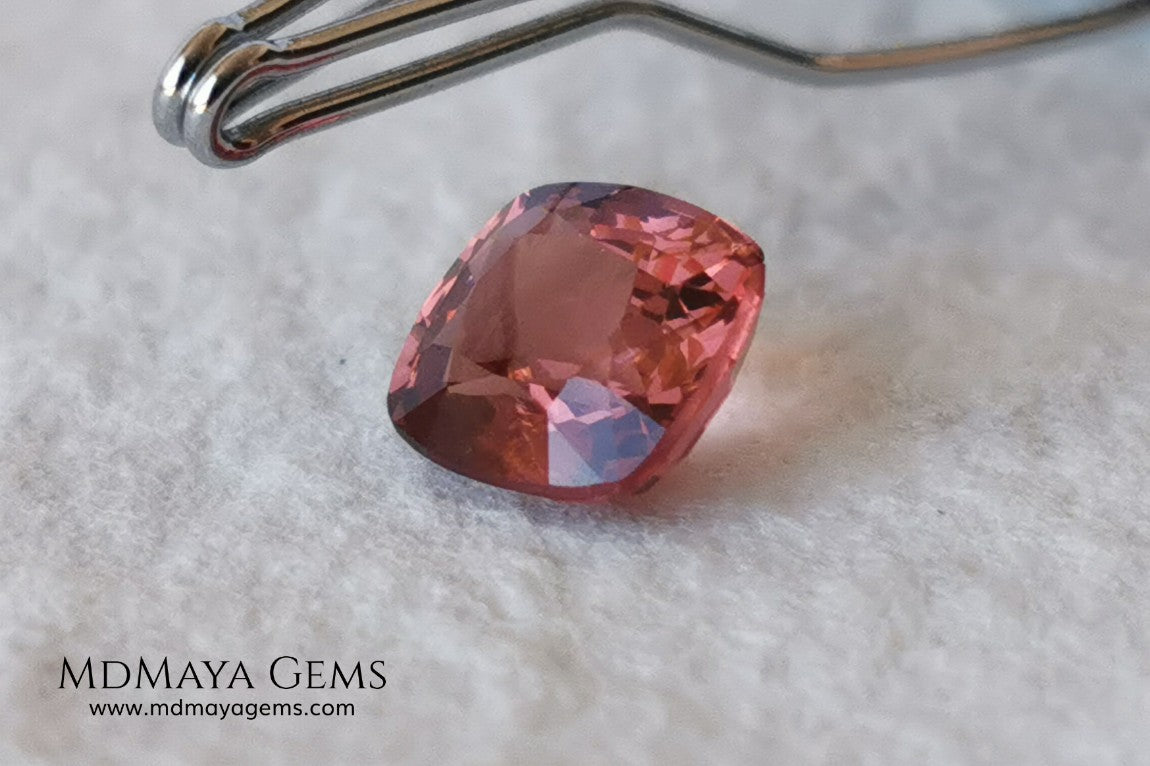 Red - Orange Spinel. Cushion Cut. 1.11 cts. Beautiful untreated gem for your personalized jewelry. This beautiful spinel is so inexpensively priced due to a fracture in the pavilion, it is not visible and does not affect the beauty of the gem at all.