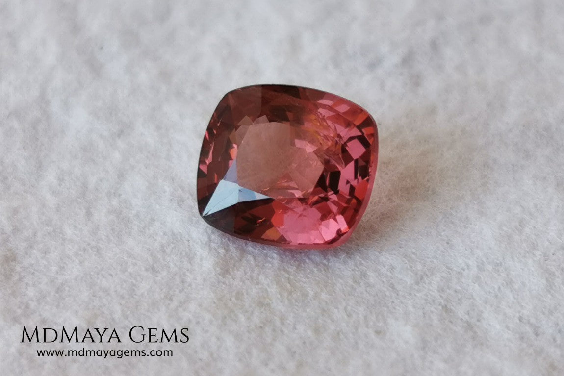 Red - Orange Spinel. Cushion Cut. 1.11 cts. Beautiful untreated gem for your personalized jewelry. This beautiful spinel is so inexpensively priced due to a fracture in the pavilion, it is not visible and does not affect the beauty of the gem at all.