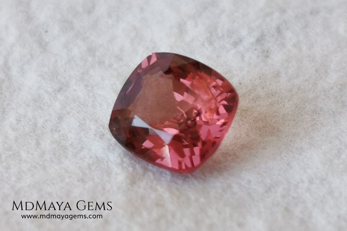 Red - Orange Spinel. Cushion Cut. 1.11 cts. Beautiful untreated gem for your personalized jewelry. This beautiful spinel is so inexpensively priced due to a fracture in the pavilion, it is not visible and does not affect the beauty of the gem at all.