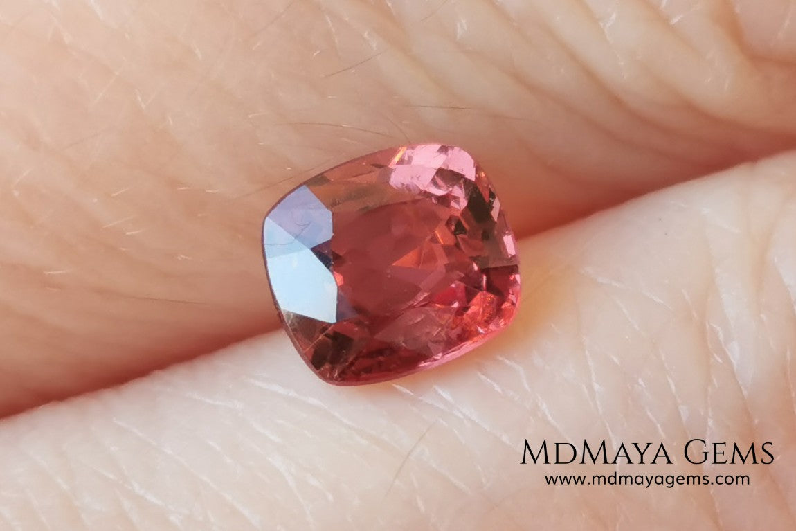 Red - Orange Spinel. Cushion Cut. 1.11 cts. Beautiful untreated gem for your personalized jewelry. This beautiful spinel is so inexpensively priced due to a fracture in the pavilion, it is not visible and does not affect the beauty of the gem at all.