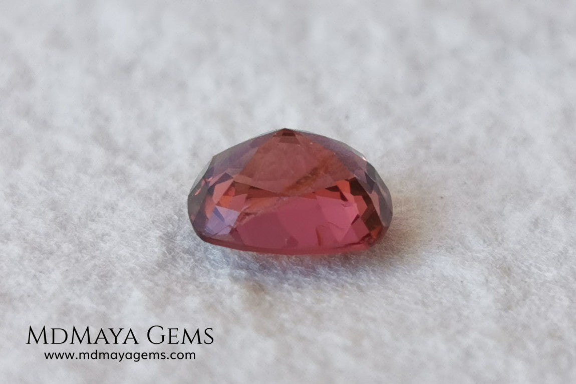 Red - Orange Spinel. Cushion Cut. 1.11 cts. Beautiful untreated gem for your personalized jewelry. This beautiful spinel is so inexpensively priced due to a fracture in the pavilion, it is not visible and does not affect the beauty of the gem at all.