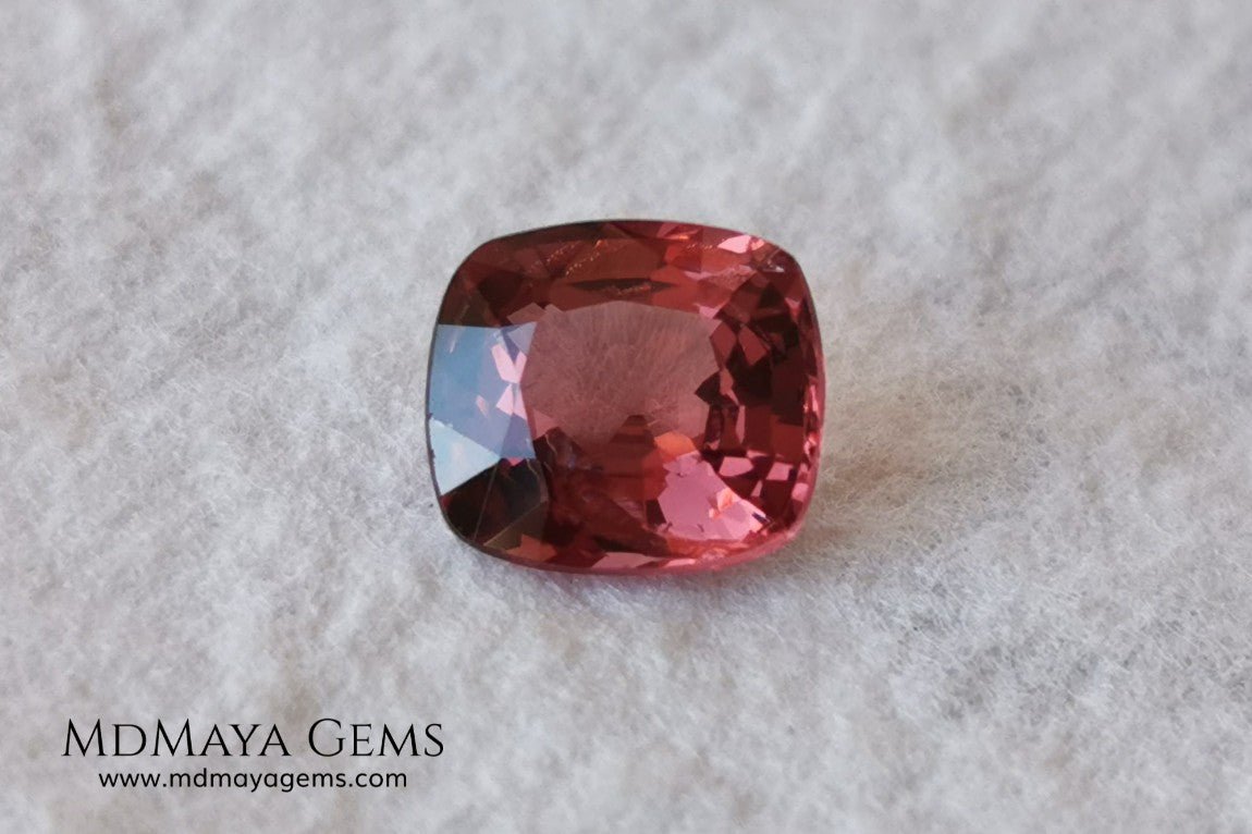 Red - Orange Spinel. Cushion Cut. 1.11 cts. Beautiful untreated gem for your personalized jewelry. This beautiful spinel is so inexpensively priced due to a fracture in the pavilion, it is not visible and does not affect the beauty of the gem at all.
