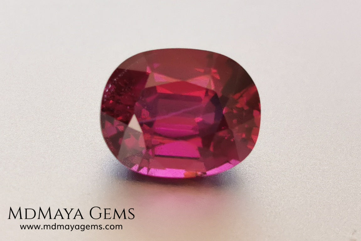 Vivid reddish purple rhodolite garnet. Oval cut, 3.87 ct.  This beauty has a story behind it, it came into my hands like a rubellite, when I analyzed it I saw that it was a garnet and not a tourmaline, I did not return it, since it has a beautiful color, very saturated, a good size and proportions, it has a very small nick in the girdle, but I'm sure it will look beautiful in any piece of jewelry you can imagine, yes, like a rhodolite garnet.