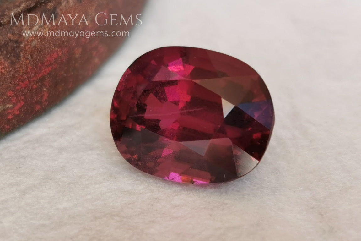 Vivid reddish purple rhodolite garnet. Oval cut, 3.87 ct.  This beauty has a story behind it, it came into my hands like a rubellite, when I analyzed it I saw that it was a garnet and not a tourmaline, I did not return it, since it has a beautiful color, very saturated, a good size and proportions, it has a very small nick in the girdle, but I'm sure it will look beautiful in any piece of jewelry you can imagine, yes, like a rhodolite garnet.