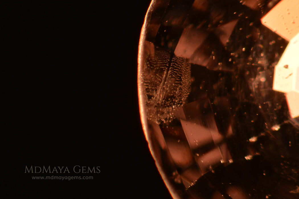 Inclusions in Pinkish Purple Spinel Round cut 2.02 ct