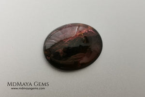 Large tourmaline rubellite, 16.08 ct, oval cabochon cut. This beautiful natural gem features two shades of color, one darker than the other. Although it has inclusions, it will be beautiful once mounted on any piece of jewelry you can imagine. And the best its price. $15 per carat.