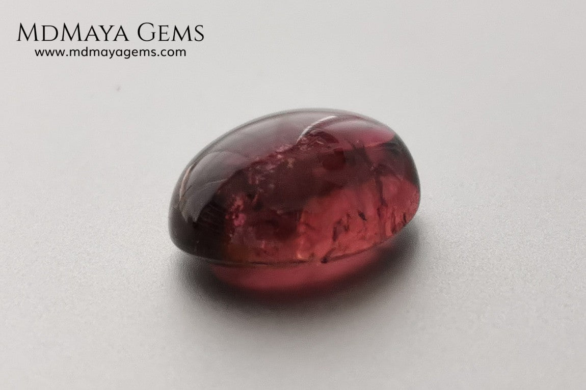 Large tourmaline rubellite, 6.16 ct, oval cabochon cut. Beautiful natural gem ideal for your personalized jewelry. This purplish red cabochon has a good size for a ring. Good price.