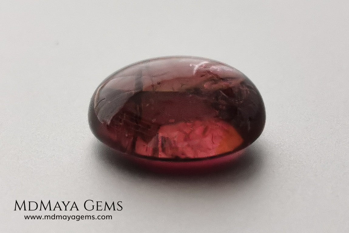 Large tourmaline rubellite, 6.16 ct, oval cabochon cut. Beautiful natural gem ideal for your personalized jewelry. This purplish red cabochon has a good size for a ring. Good price.