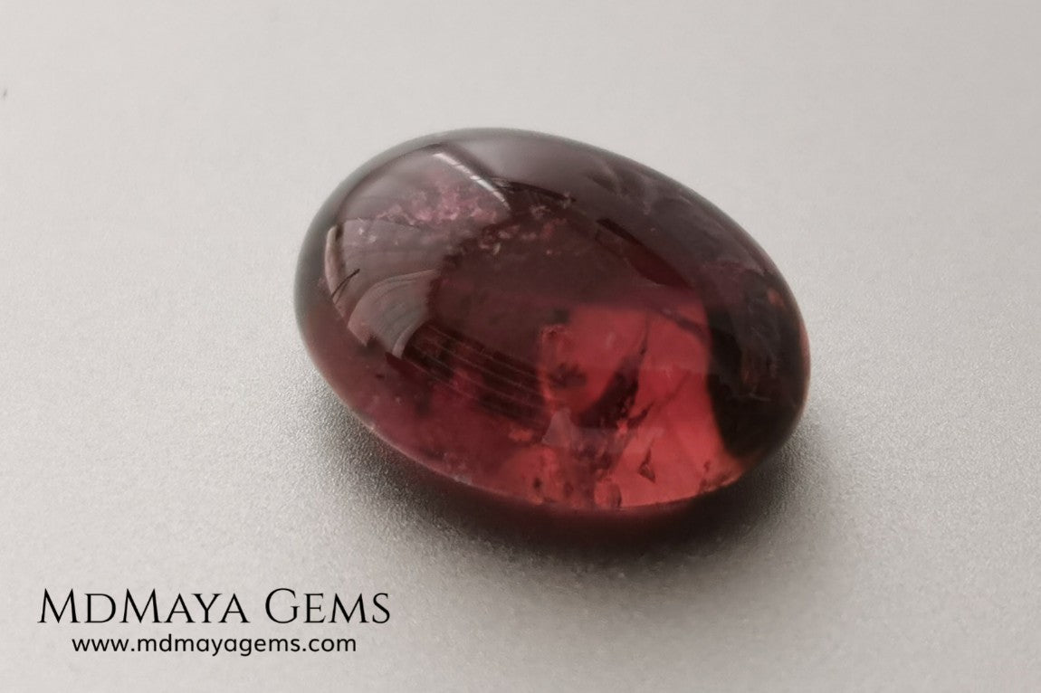 Large tourmaline rubellite, 6.16 ct, oval cabochon cut. Beautiful natural gem ideal for your personalized jewelry. This purplish red cabochon has a good size for a ring. Good price.